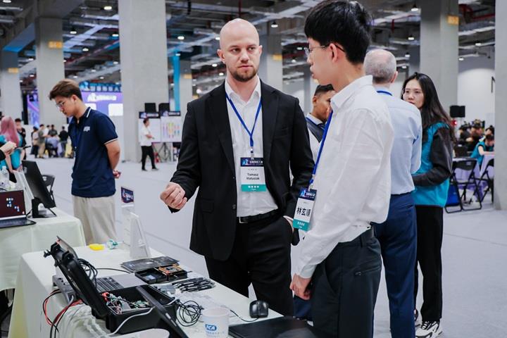 Participating teams at Best AI Awards networking and exchanging ideas.