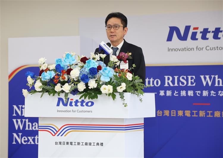 Nitto Denko Corporation President and Representative Director Tatsuya Akagi delivers remarks. 