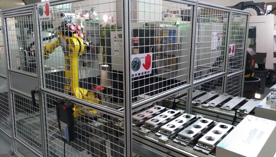 圖3 HAAS Automation立式加工中心、數控車床與機器手臂所組成的製造單元